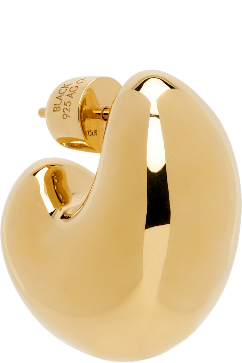 Single stud earring in 18k gold-plated recycled sterling silver.

· Post-stud fastening
· H1" x D1"

Supplier color: Recycled sterling silver/18k gold plated