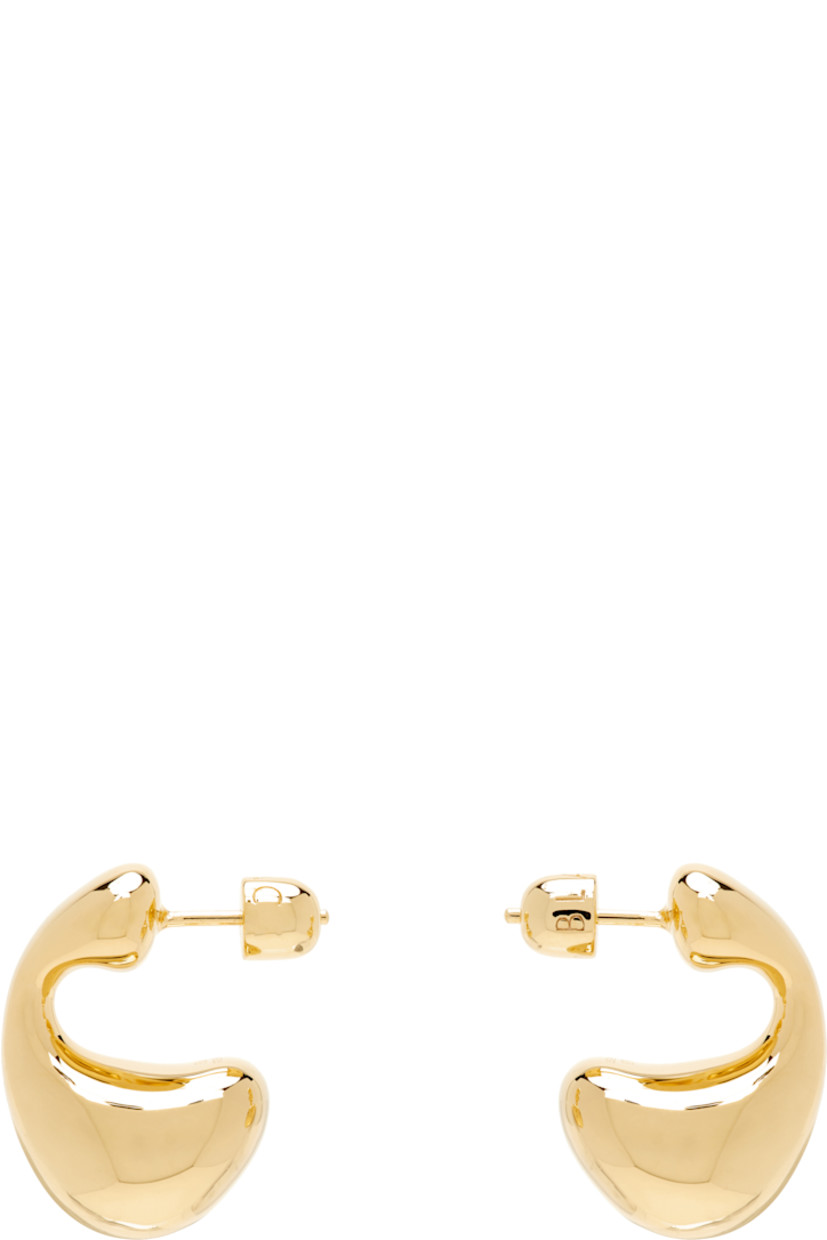 Pair of hoop earrings in 18k gold-plated sterling silver. 

· Post-stud fastening
· H1" x D0.25"

Supplier color: Sterling silver