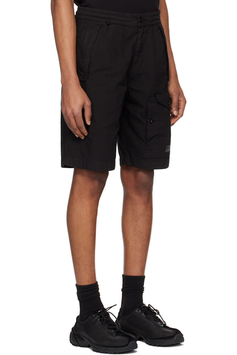 Cotton canvas cargo shorts.

· Elasticized waistband
· Three-pocket styling
· Zip fly
· Logo-embroidered flap pocket at front
· Logo patch at back
· Logo-engraved black hardware

Supplier color: Black