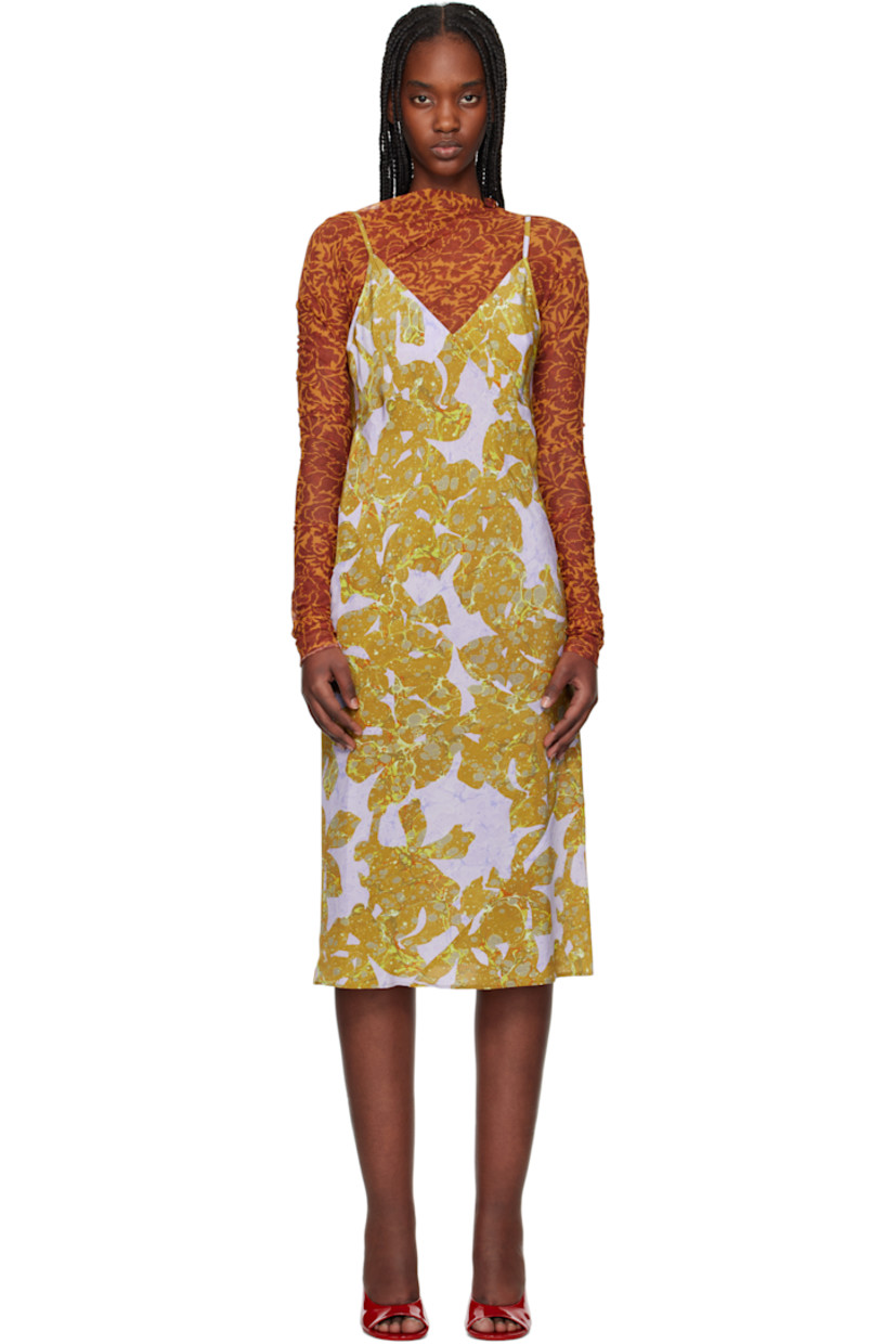 Sheer stretch nylon mesh midi dress.  

· Graphic pattern printed throughout
· V-neck
· Adjustable spaghetti shoulder straps
· Unlined 

Supplier color: Ocra