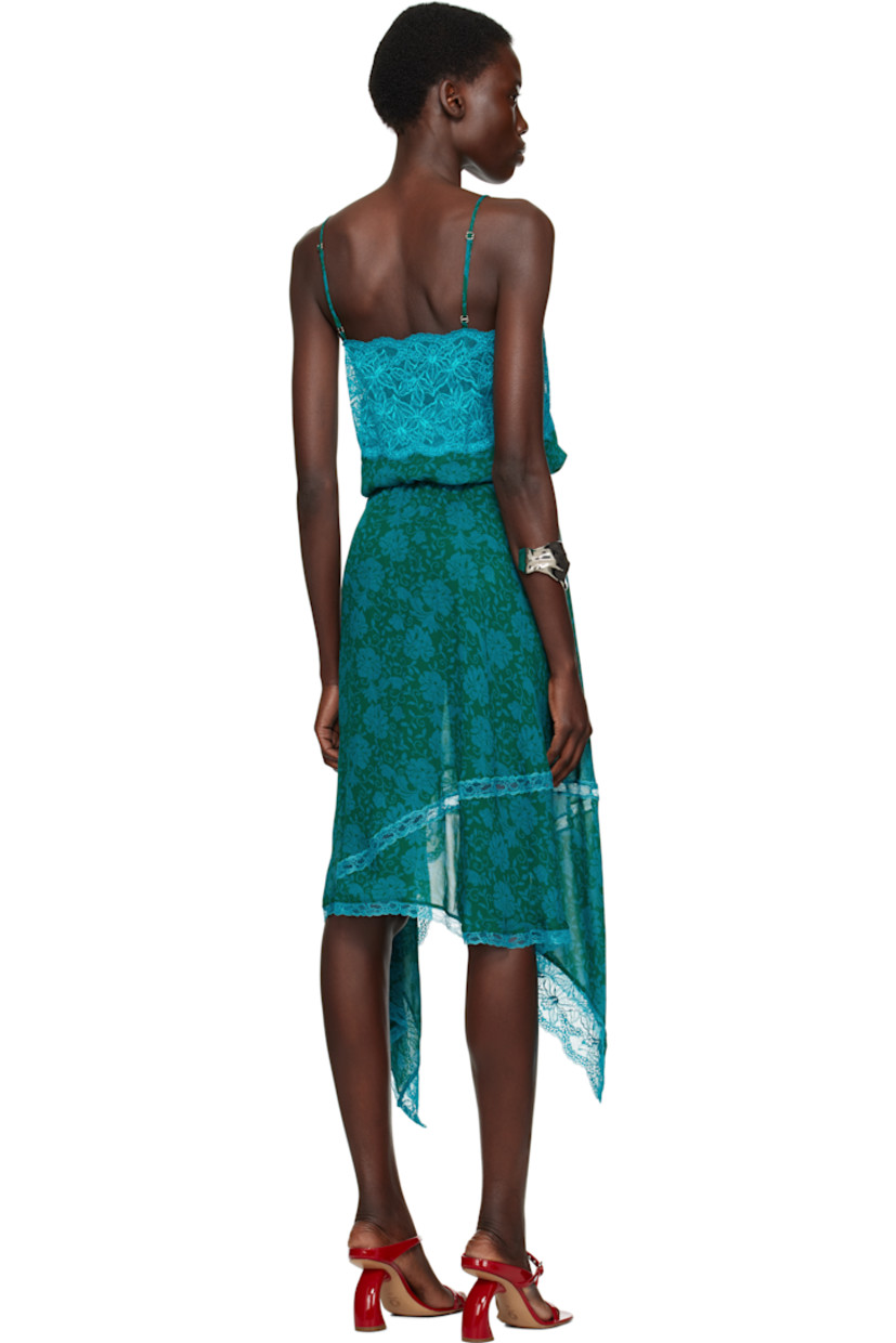 Viscose crêpe slip-style midi dress. Printed floral pattern and lace trim throughout.

· Semi-sheer
· Paneled construction
· Sweetheart neck
· Darts and button fastening at chest
· Drawstring at waist 
· Handkerchief hem
· Adjustable spaghetti straps


Supplier color: Turquoise