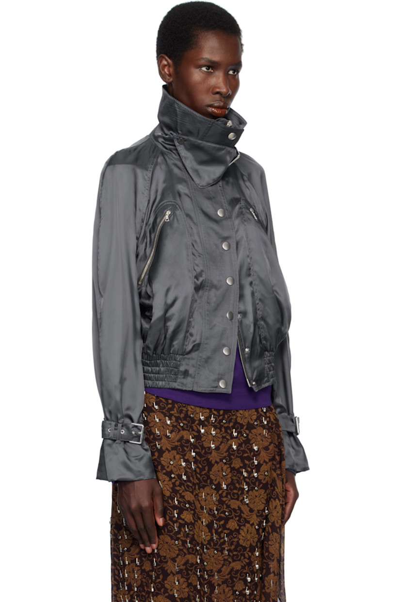 Viscose satin bomber jacket. 

· Fold-down stand collar
· Detachable pin-buckle throat guard at collar
· Two-way zip closure with press-stud placket
· Zip and welt pockets
· Elasticized cropped hem 
· Raglan sleeves
· Loops and pin-buckle tab at cuffs

Supplier color: Raf