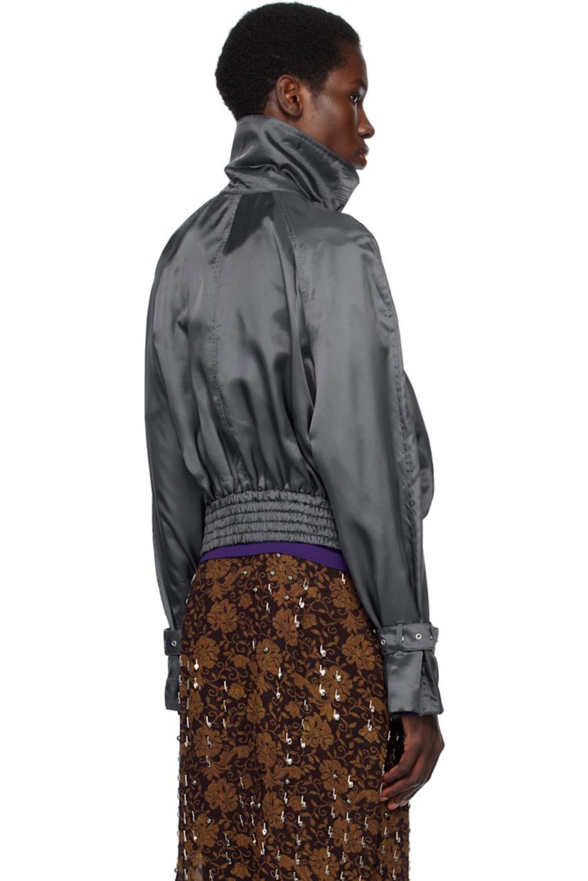 Viscose satin bomber jacket. 

· Fold-down stand collar
· Detachable pin-buckle throat guard at collar
· Two-way zip closure with press-stud placket
· Zip and welt pockets
· Elasticized cropped hem 
· Raglan sleeves
· Loops and pin-buckle tab at cuffs

Supplier color: Raf