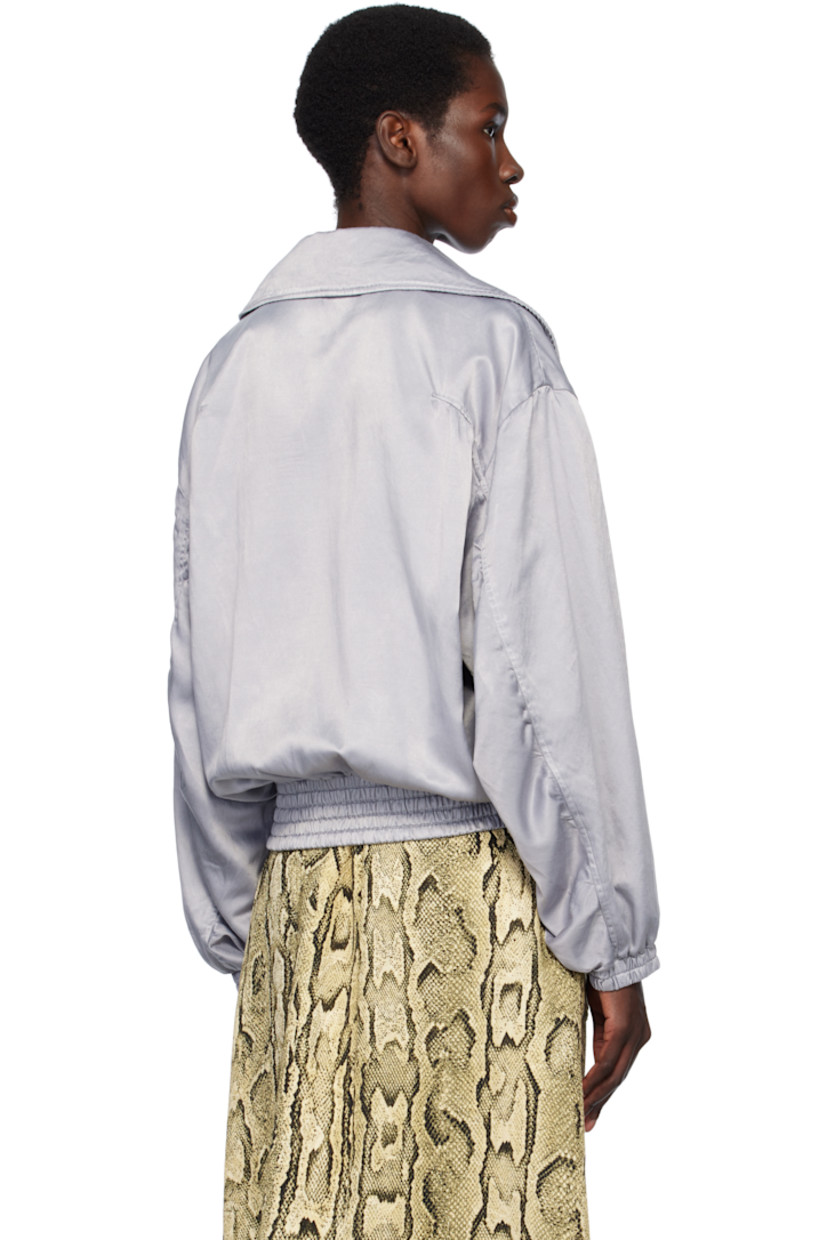 Cupro- and cotton-blend twill bomber jacket. 

· Asymmetric spread collar
· Belt loops and pin-buckle fastening at collar
· Two-way zip closure with press-stud placket
· Zip and welt pockets
· Elasticized hem and cuffs
· Dropped shoulders
· Satin lining

Supplier color: Light blue