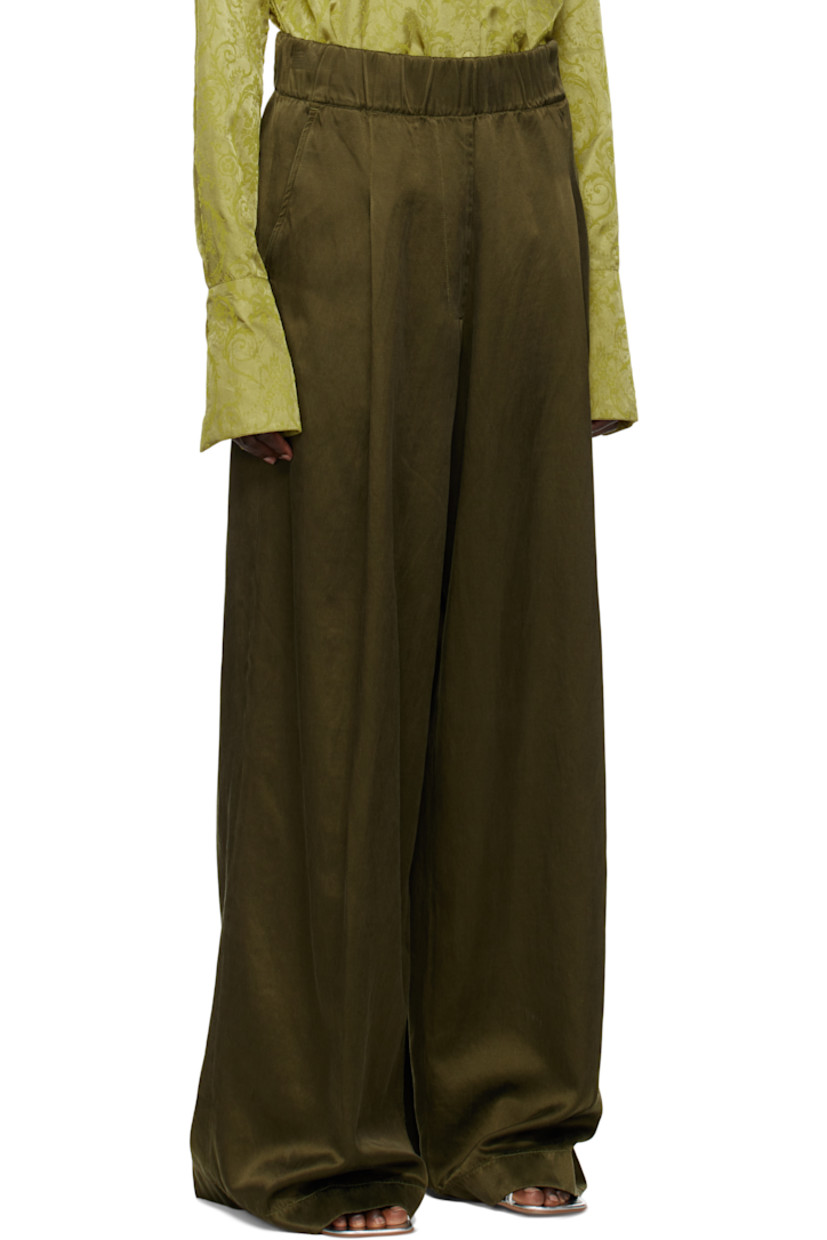 Garment-dyed cupro- and cotton-blend twill satin trousers.

· Loose-fit and wide-leg
· High-rise
· Concealed drawstring at elasticized waistband
· Three-pocket styling
· Mock fly
· Pleats at front

Supplier color: Khaki
