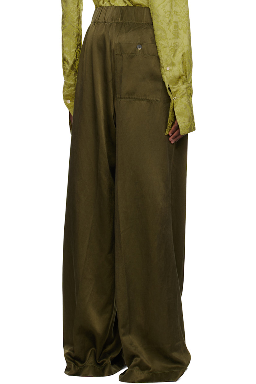 Garment-dyed cupro- and cotton-blend twill satin trousers.

· Loose-fit and wide-leg
· High-rise
· Concealed drawstring at elasticized waistband
· Three-pocket styling
· Mock fly
· Pleats at front

Supplier color: Khaki