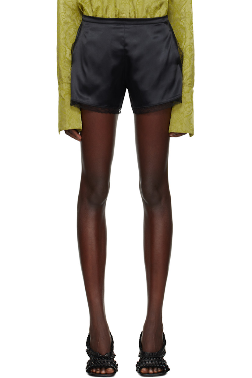 Stretch silk satin shorts. 

· Partially elasticized waistband
· Two-pocket styling
· Scalloped lace trim at cuffs
· Vented side seams

Supplier color: Black