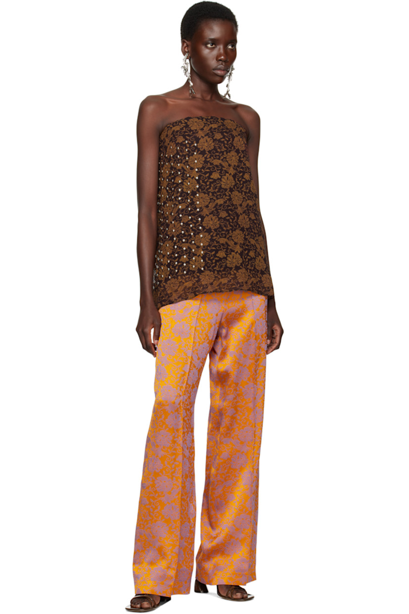 Viscose crêpe top. Floral pattern printed throughout.

· Layered construction
· Straight neck
· Boning at front and back
· Studs at side seam
· Gathering and concealed hook-eye closure at back 
· Corset-style underlay with elasticized hem 
· Full satin lining 

Supplier color: Dark brown