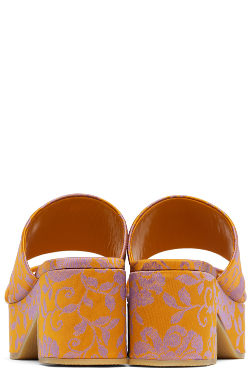 Damask slip-on heeled sandals in orange.

· Jacquard floral pattern throughout
· Thong-style strap at vamp
· Logo patch at covered footbed
· Covered block heel
· Covered platform midsole
· Crêpe-rubber sole
· Platform: H1.75"
· Heel: H2.75"

Supplier color: Mandarin