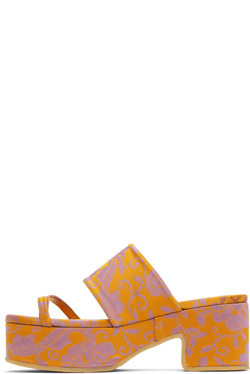Damask slip-on heeled sandals in orange.

· Jacquard floral pattern throughout
· Thong-style strap at vamp
· Logo patch at covered footbed
· Covered block heel
· Covered platform midsole
· Crêpe-rubber sole
· Platform: H1.75"
· Heel: H2.75"

Supplier color: Mandarin