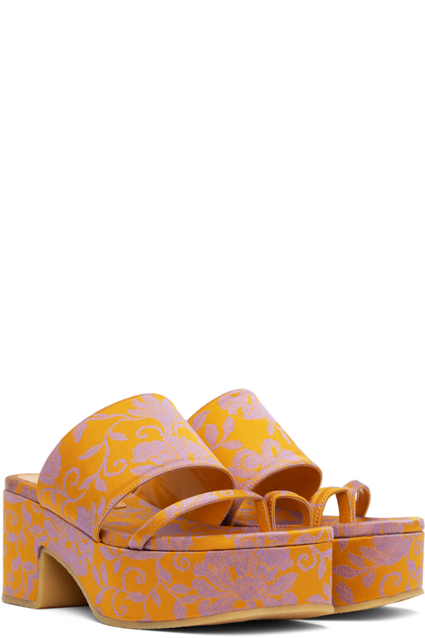 Damask slip-on heeled sandals in orange.

· Jacquard floral pattern throughout
· Thong-style strap at vamp
· Logo patch at covered footbed
· Covered block heel
· Covered platform midsole
· Crêpe-rubber sole
· Platform: H1.75"
· Heel: H2.75"

Supplier color: Mandarin