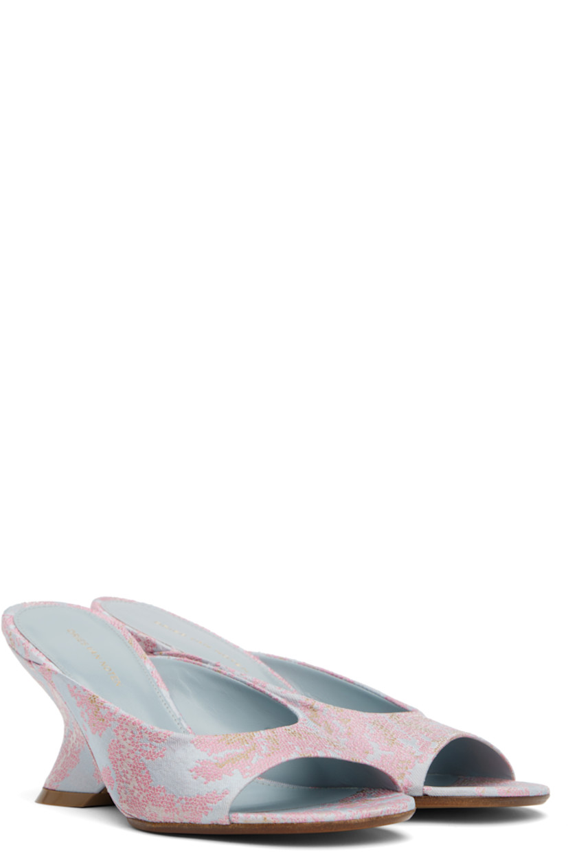 Damask slip-on heeled sandals in blue.

· Jacquard floral pattern throughout
· Open toe
· Logo stamp at padded leather footbed
· Covered wedge heel with rubber injection
· Polished leather sole
· Heel: H2.75"

Supplier color: Pale blue