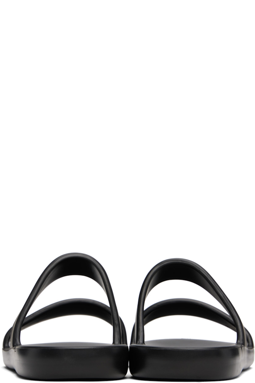 Lightweight foam rubber flat sandals in black.

· Open toe
· Logo embossed at molded footbed
· Treaded foam rubber sole

Supplier color: Black