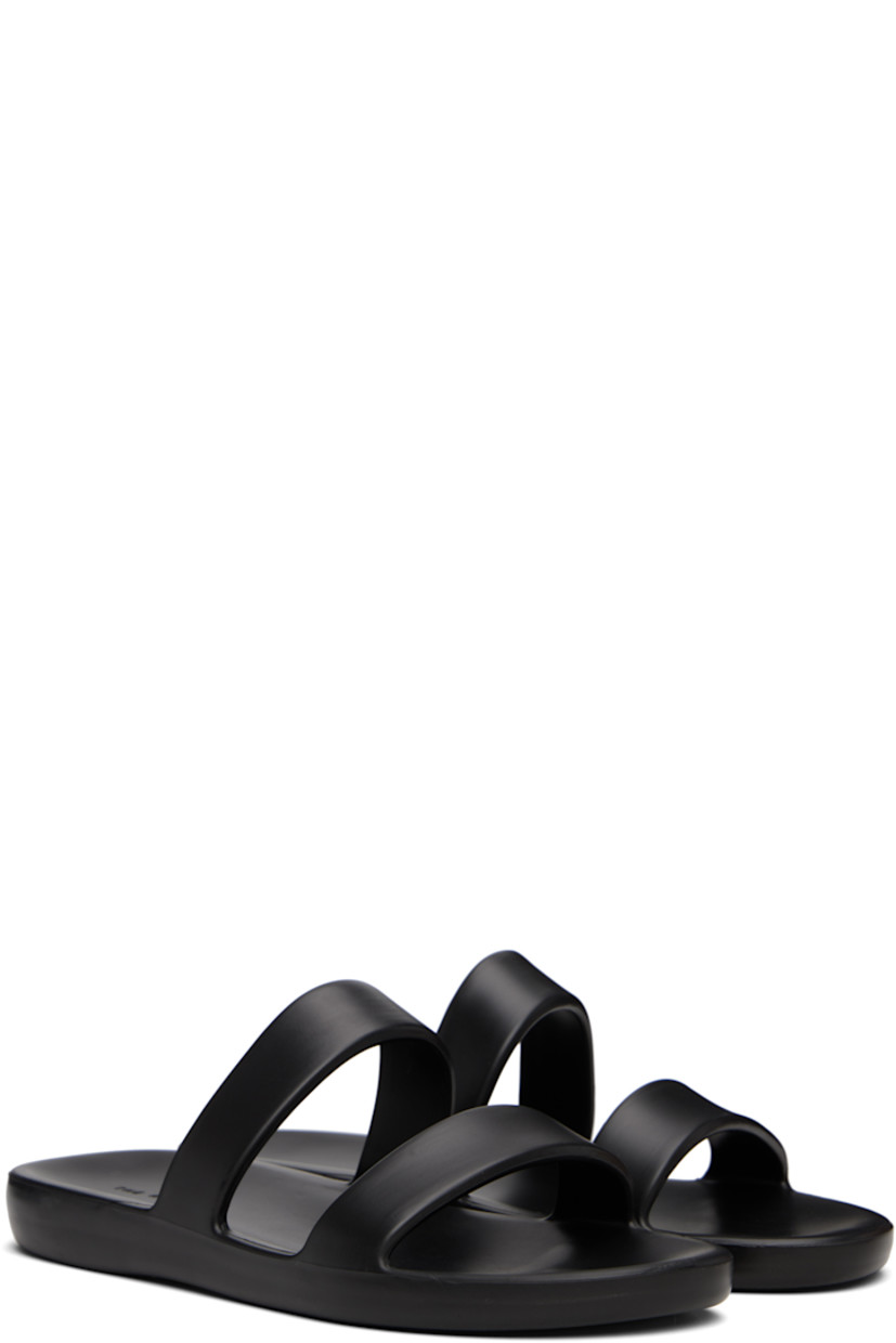 Lightweight foam rubber flat sandals in black.

· Open toe
· Logo embossed at molded footbed
· Treaded foam rubber sole

Supplier color: Black