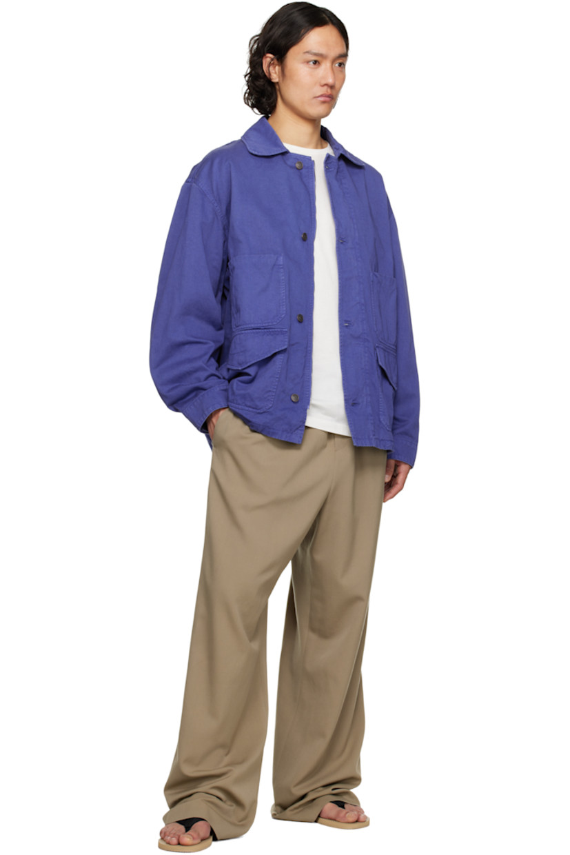 Boxy-fit cotton twill jacket. Subtle fading throughout.

· Detachable throat guard at spread collar
· Two-way zip closure with button placket
· Patch pockets and flap pockets
· Concealed bungee-style drawstring at hem
· Eyelets at underarms
· Dropped shoulders
· Press-stud barrel cuffs
· Concealed kangaroo pocket at back
· Logo-engraved copper-tone hardware

Supplier color: Celtic blue