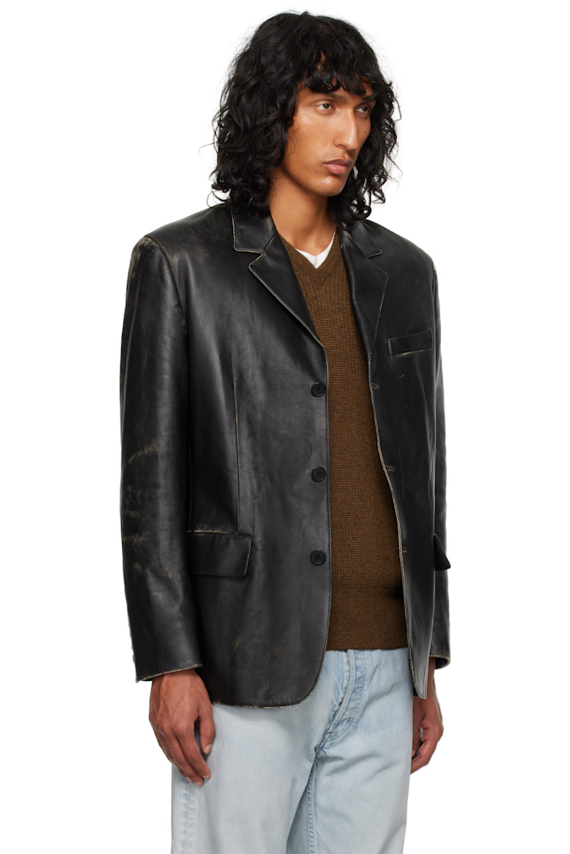 Buffed leather jacket. Subtle distressing throughout.

· Notched lapel
· Button closure
· Welt pocket and flap pockets
· Padded shoulders
· Four-button surgeon's cuffs
· Welt pockets at interior
· Silk habotai lining

Supplier color: Black
