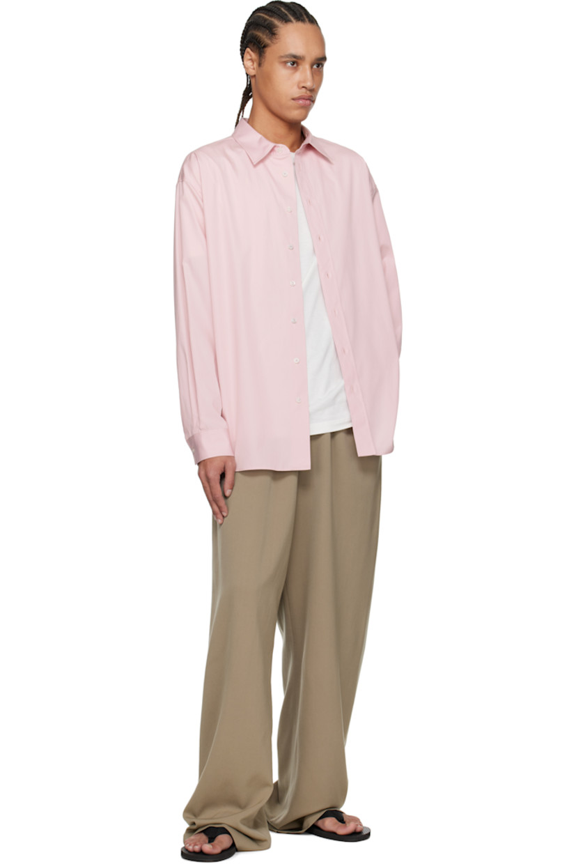 Relaxed-fit cotton poplin shirt. 

· Spread collar
· Button closure
· Shirttail hem
· Dropped shoulders
· Single-button barrel cuffs
· Mother-of-pearl hardware

Supplier color: Pink
