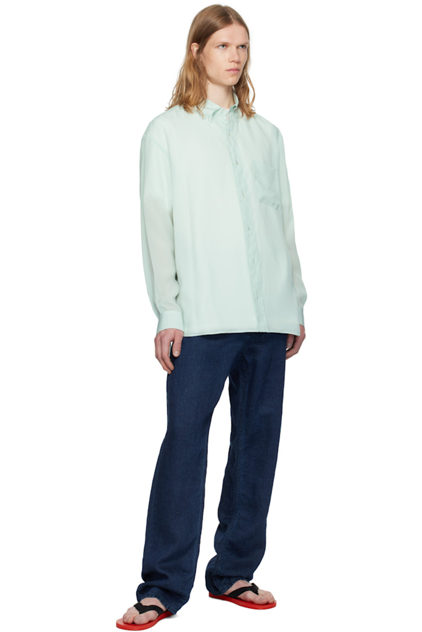 Semi-sheer plain-woven cupro shirt.

· Spread collar
· Button closure
· Patch pocket at chest
· Shirttail hem
· Buttoned barrel cuffs
· Pleats at back yoke
· Mother-of-pearl hardware

Supplier color: Light sage