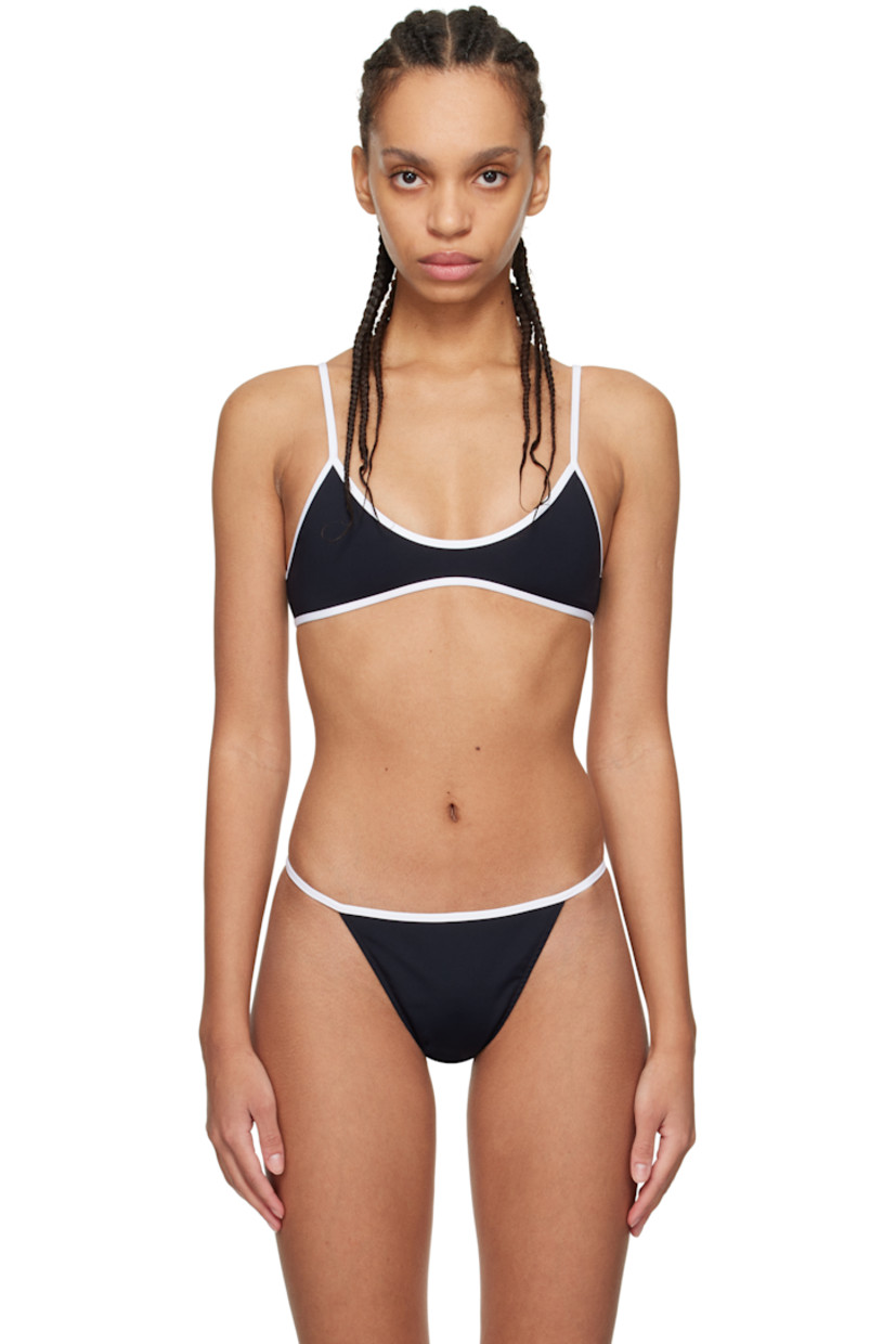LYCRA® XTRA LIFE™ stretch ECONYL® recycled nylon jersey bikini top.

· UV protection 
· Scoop neck
· Elasticized spaghetti straps

Supplier color: Black/White