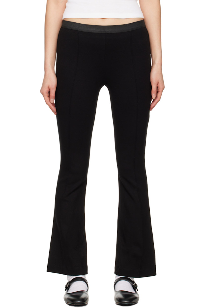 Stretch viscose jersey trousers. 

· Elasticized waistband
· Pinched seams at front and back 
· Flared cuffs

Supplier color: Black