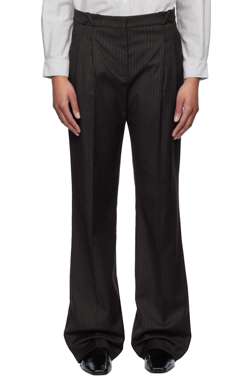 Stretch polyester- and viscose-blend twill trousers. Pinstripes throughout.

· Belt loops
· Three-pocket styling
· Zip fly
· Pleats at front
· Creased legs

Supplier color: Chocolate