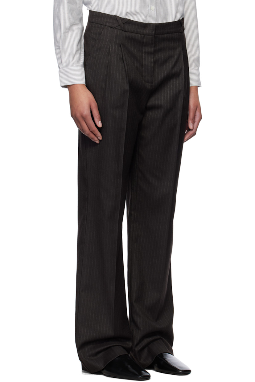Stretch polyester- and viscose-blend twill trousers. Pinstripes throughout.

· Belt loops
· Three-pocket styling
· Zip fly
· Pleats at front
· Creased legs

Supplier color: Chocolate