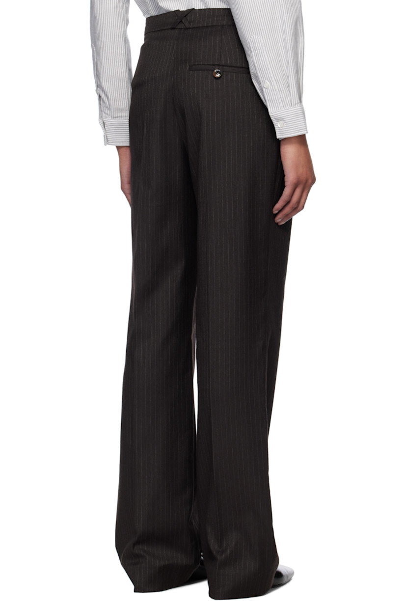 Stretch polyester- and viscose-blend twill trousers. Pinstripes throughout.

· Belt loops
· Three-pocket styling
· Zip fly
· Pleats at front
· Creased legs

Supplier color: Chocolate