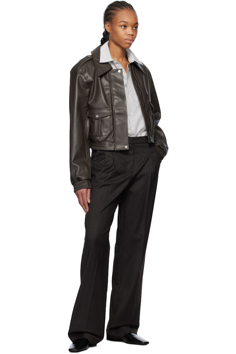 Stretch polyester- and viscose-blend twill trousers. Pinstripes throughout.

· Belt loops
· Three-pocket styling
· Zip fly
· Pleats at front
· Creased legs

Supplier color: Chocolate