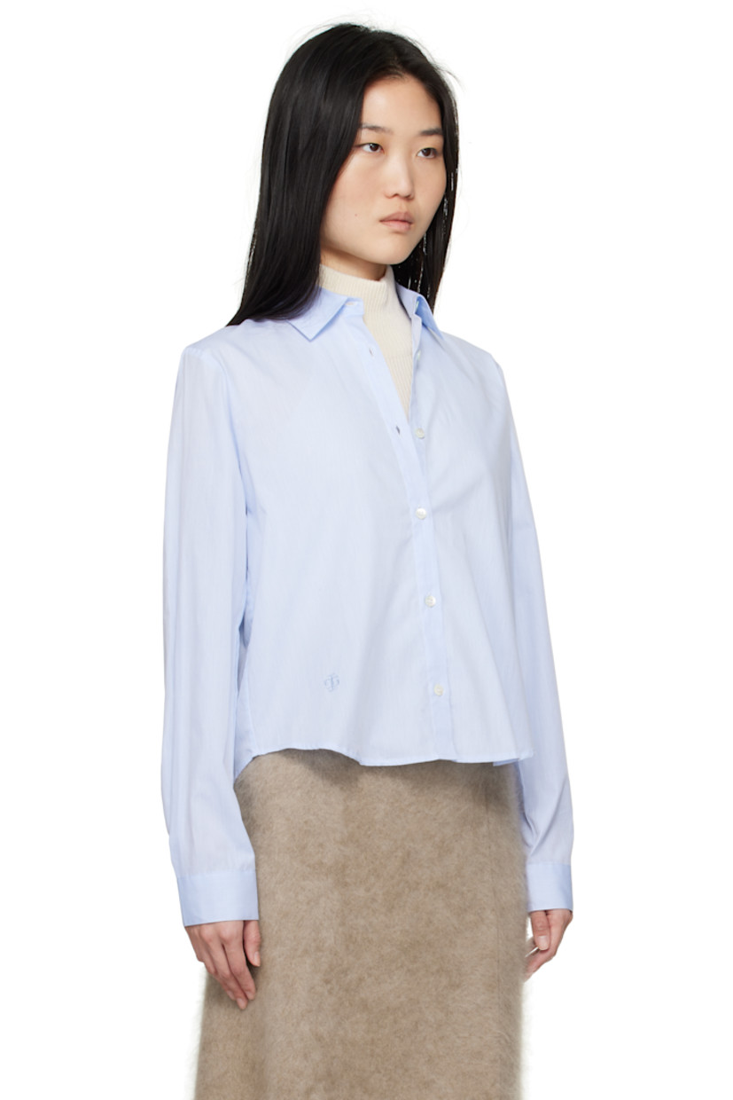 Cotton poplin shirt.

· Spread collar
· Button closure
· Logo embroidered at front
· Cropped shirttail hem
· Single-button barrel cuffs
· Self-tie straps at vented back

Supplier color: Dusty blue