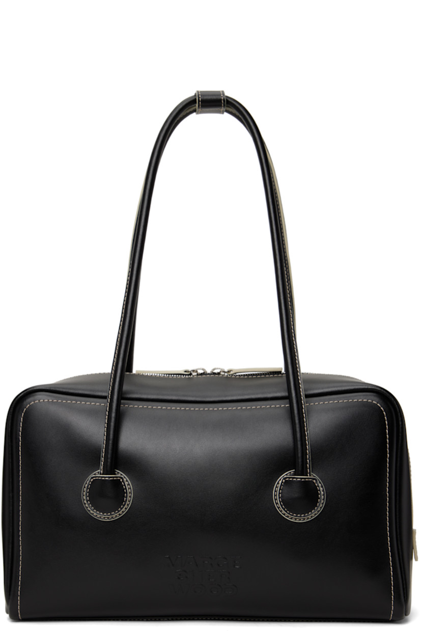 Buffed leather shoulder bag in black.

· Press-stud tab at rolled shoulder straps
· Logo embossed at face
· Two-way zip closure
· Zip and patch pockets at interior
· Logo-woven twill lining
· Contrast stitching in off-white
· H7.5" x W12.5" x D3.5"

Supplier color: Black plain