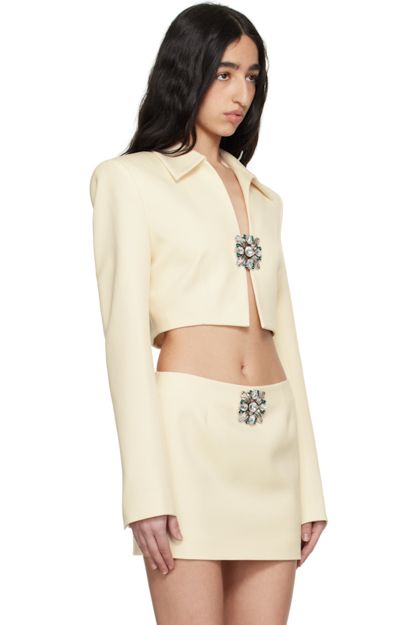 Virgin wool twill jacket.

· Spread collar
· Hardware with crystals at hook-eye closure
· Cropped hem
· Padded shoulders
· Vent at cuffs
· Full viscose satin lining

Supplier color: Whipped white