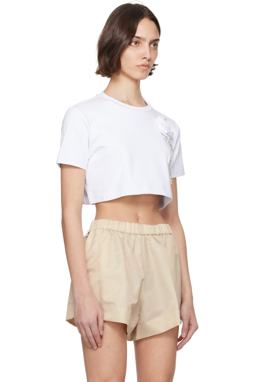 Stretch cotton jersey T-shirt. 

· Crewneck
· Floral appliqué and prong-set crystals at front 
· Cropped hem 

Supplier color: White