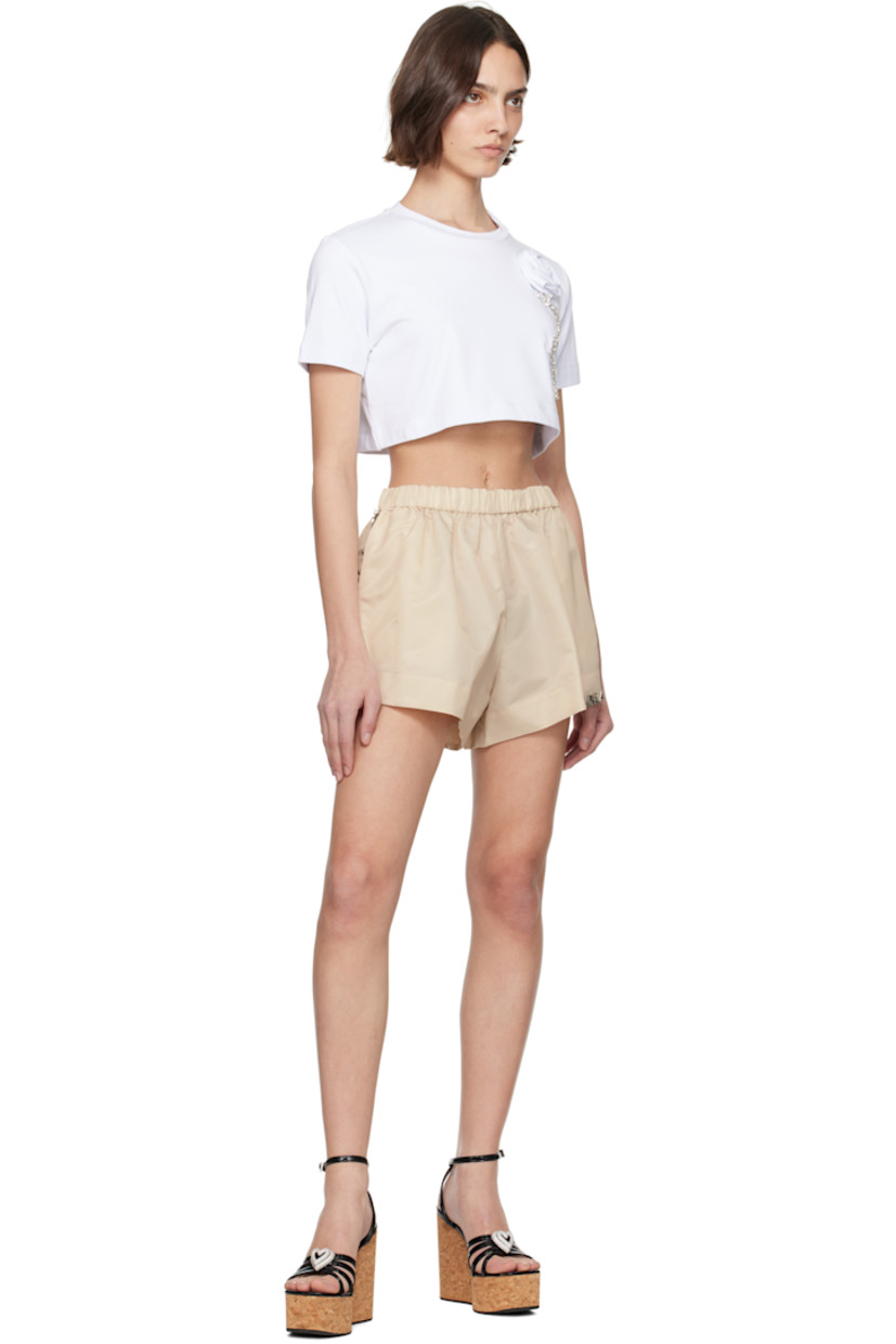 Stretch cotton jersey T-shirt. 

· Crewneck
· Floral appliqué and prong-set crystals at front 
· Cropped hem 

Supplier color: White