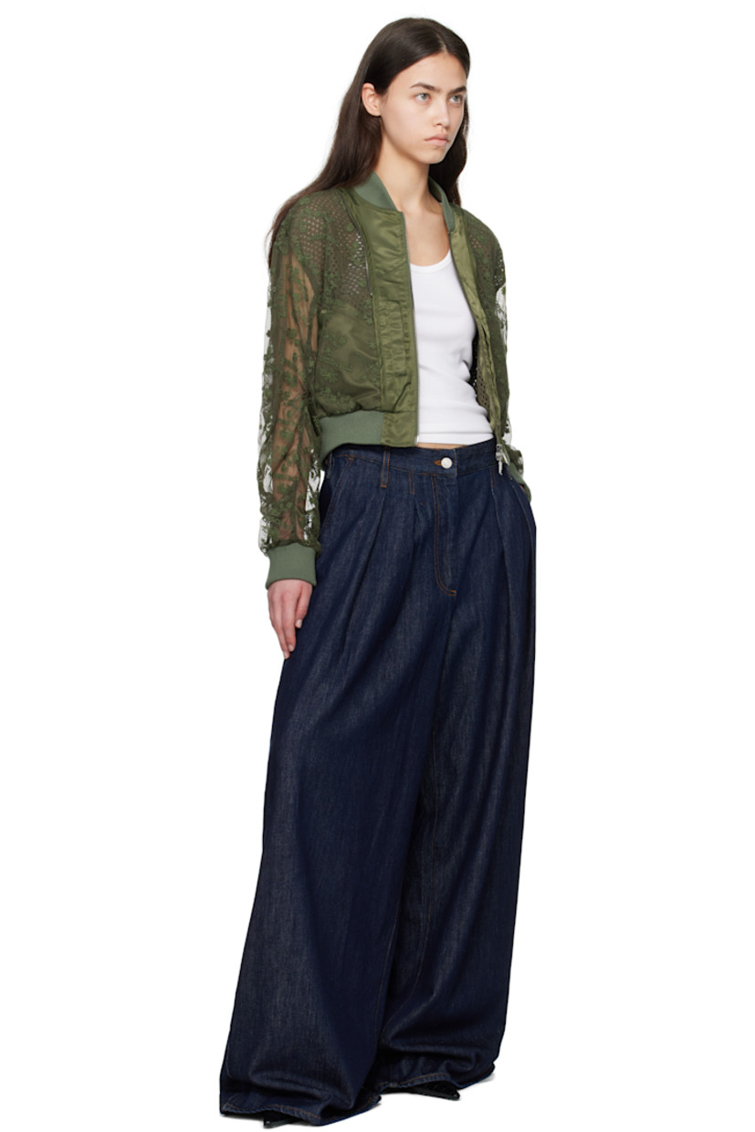 Semi-sheer cotton- and nylon-blend mesh bomber jacket. Logo and floral pattern embroidered throughout.

· Rib-knit stand collar, hem, and cuffs
· Nylon twill trim and zip detailing at collar and placket
· Two-way zip closure
· Welt pockets
· Cropped hem
· Logo patch at back collar
· Partial mesh lining

Supplier color: Brown