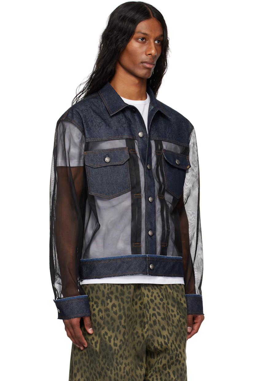 Semi-sheer polyester tulle and non-stretch denim jacket. Raw edges throughout.

· Paneled construction
· Spread collar
· Button closure
· Graphic topstitching at yoke
· Pleats at front
· Flap pockets at chest
· Cropped hem
· Buttoned cuffs
· Adjustable button tabs at back hem
· Logo-engraved antiqued silver-tone hardware
· Contrast stitching in tan

Supplier color: Blue