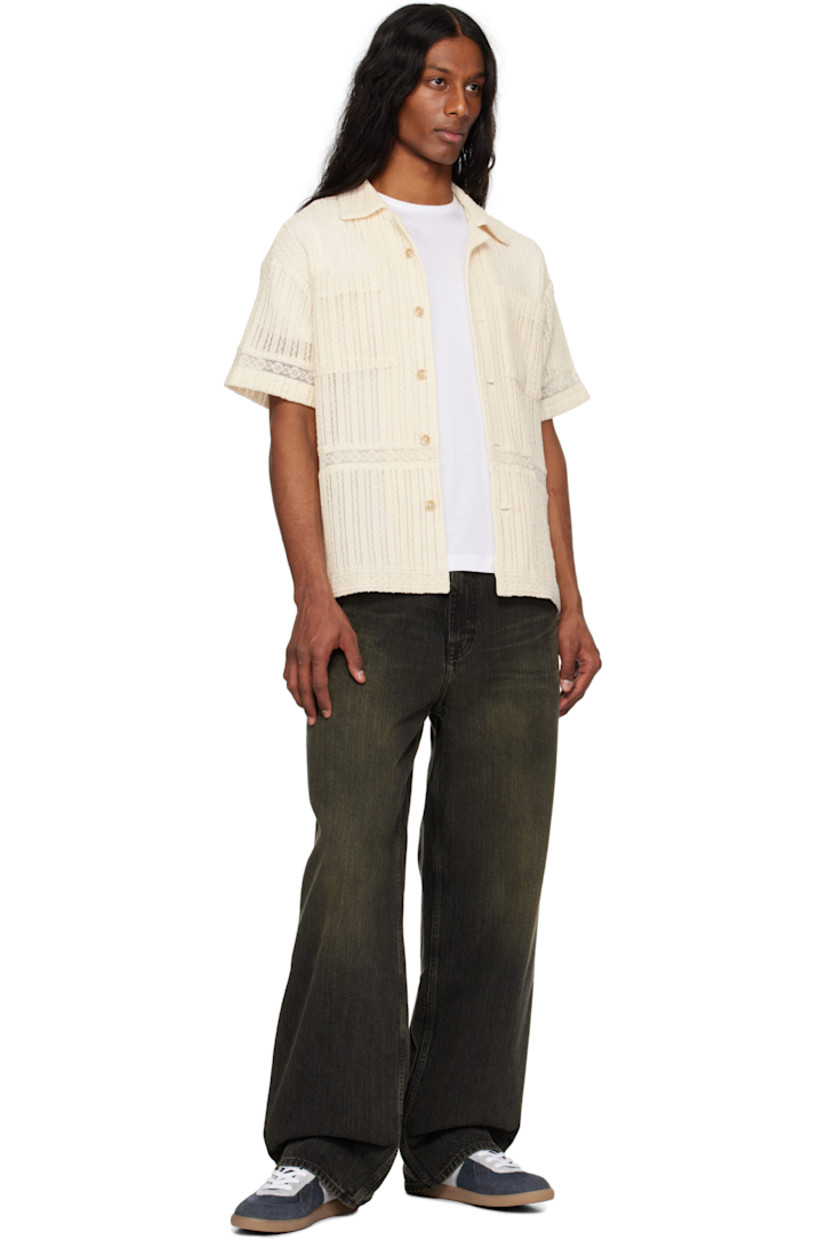 Open-knit polyester- and cotton-blend shirt. Laddering throughout.

· Open spread collar
· Button closure
· Patch pockets at chest
· Vented side seams
· Logo-engraved hardware

Supplier color: Ecru