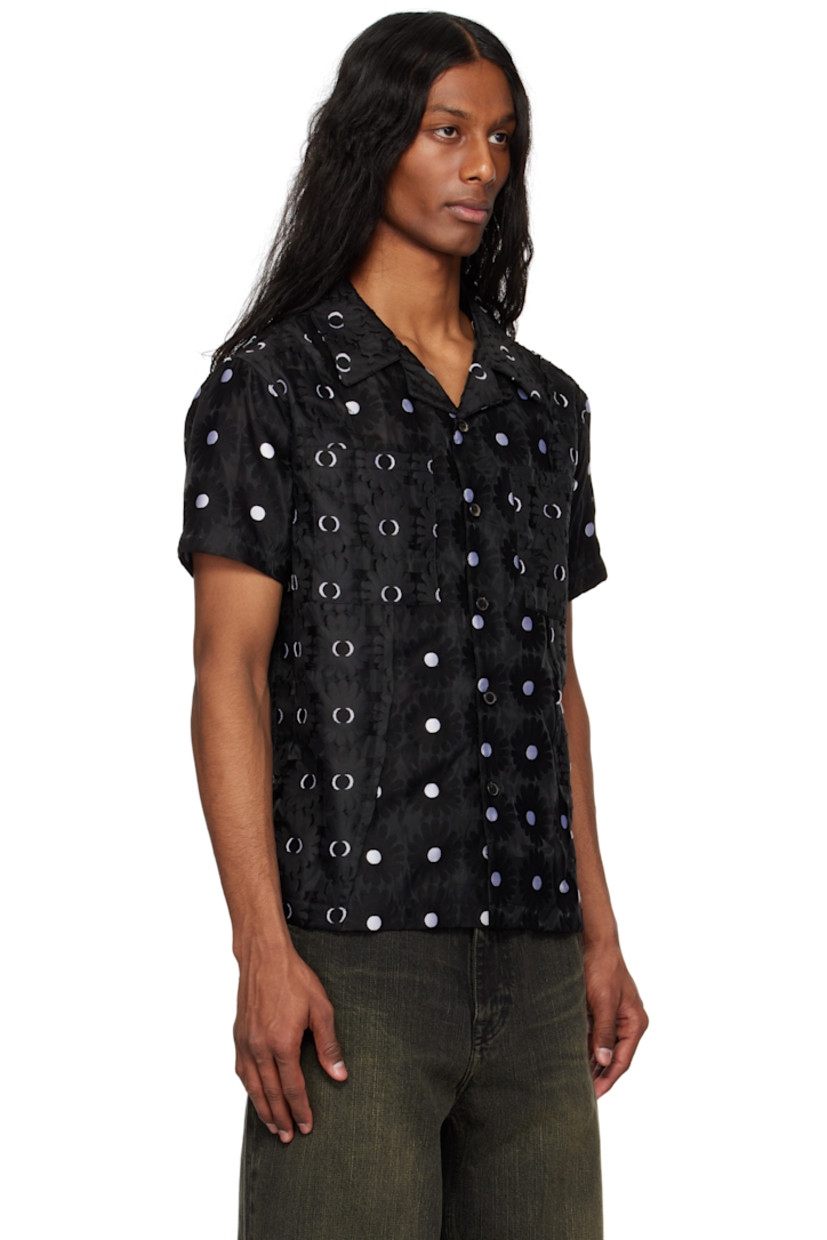 Semi-sheer viscose-blend tulle shirt. Floral pattern throughout.

· Button fastening at open spread collar
· Button closure
· Patch pockets at chest
· Pleats at front
· Logo flag at patch pocket
· Vented side seams
· Twin pleats back yoke
· Fully lined

Supplier color: Black