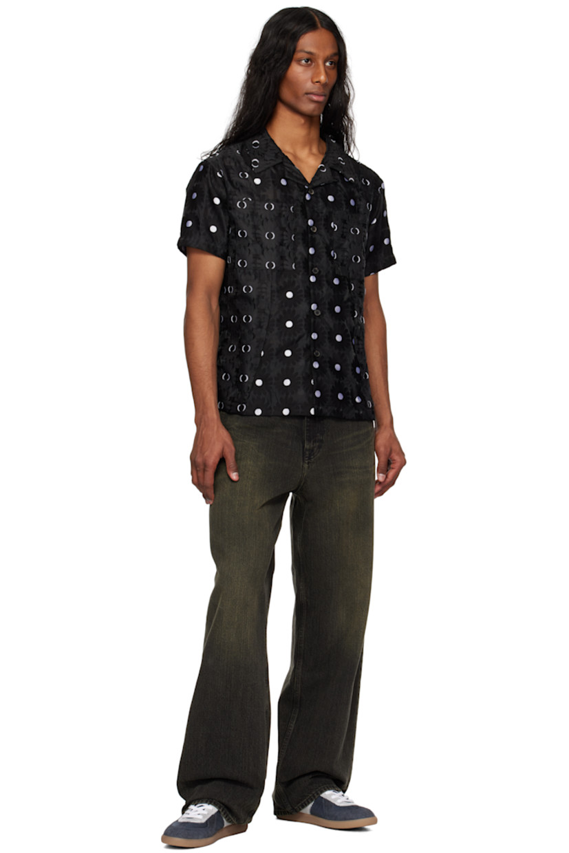 Semi-sheer viscose-blend tulle shirt. Floral pattern throughout.

· Button fastening at open spread collar
· Button closure
· Patch pockets at chest
· Pleats at front
· Logo flag at patch pocket
· Vented side seams
· Twin pleats back yoke
· Fully lined

Supplier color: Black