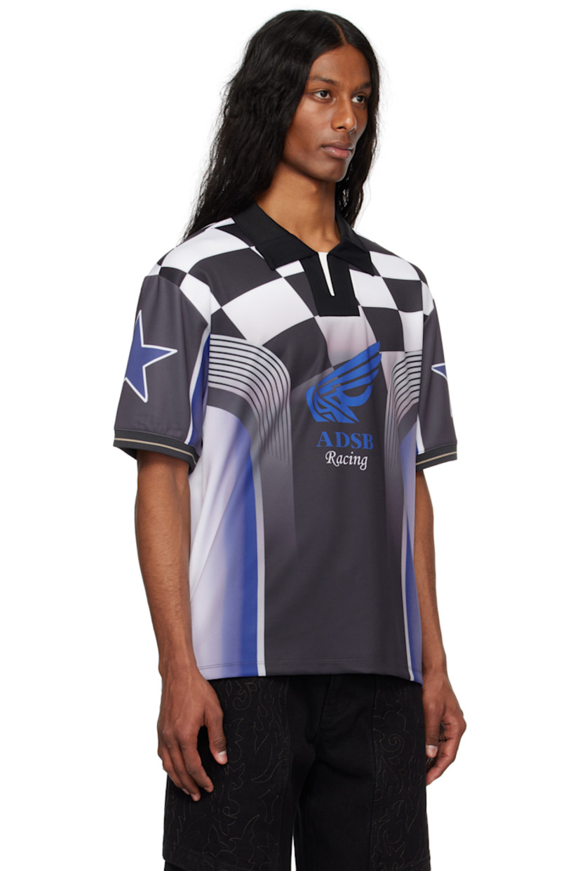 Stretch polyester interlock jersey polo. Graphics printed throughout.

· Paneled construction
· Rib-knit spread collar and cuffs
· Logo graphic printed at front and back
· Stripe at cuffs
· Logo patch at back hem

Supplier color: Blue/Black