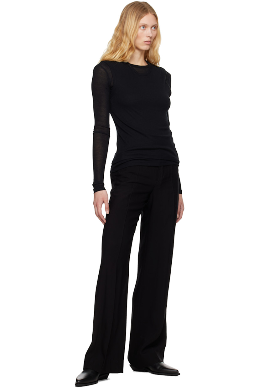 Loose-fit and flared viscose canvas trousers.

· Belt loops
· Four-pocket styling
· Zip fly
· Creased legs

Supplier color: Black