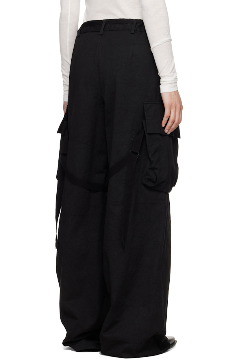 Wide-leg cotton twill cargo pants.

· Belt loops
· Two-pocket styling
· Button fly
· Detachable webbing strap with logo plaque at front
· Cinch strap at legs
· Drawstring at cuffs 
· Cargo pocket at outseams

Supplier color: Black