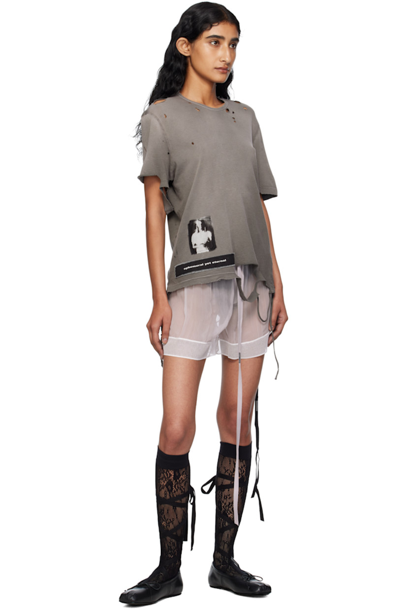 Sheer silk crepon shorts.

· Lace trim at waistband and cuffs
· Drawstring at elasticized waistband
· Mock fly

Supplier color: Mauve