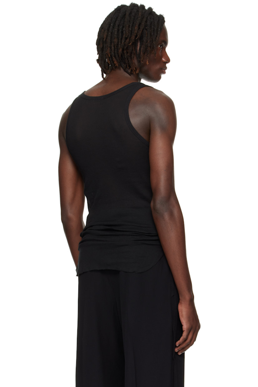 Lightweight rib-knit cotton tank top.

· Semi-sheer
· Scoop neck
· Raw edge at hem
· Ruching with grosgrain strap at sides

Supplier color: Black