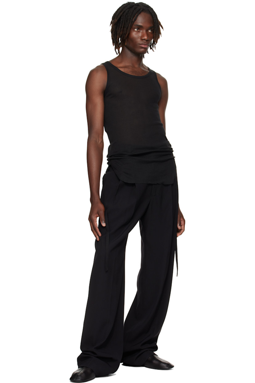 Lightweight rib-knit cotton tank top.

· Semi-sheer
· Scoop neck
· Raw edge at hem
· Ruching with grosgrain strap at sides

Supplier color: Black