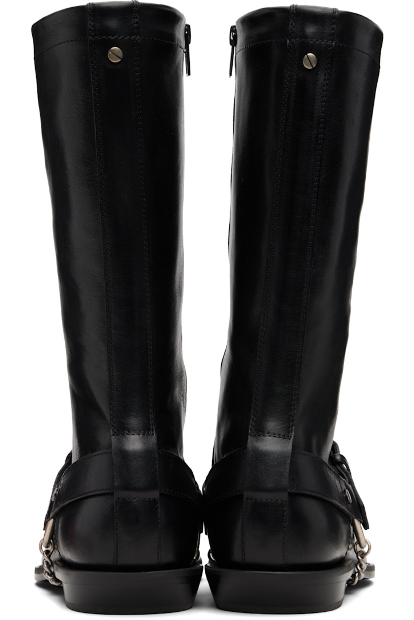 Mid-calf buffed nappa leather boots.

· Pointed toe
· Harness-style pin-buckle strap
· Rivet at heel collar
· Zip closure at inner side
· Buffed leather lining
· Stacked leather block heel with rubber injection
· Curb chain detailing at sole
· Polished leather sole

Supplier color: Black