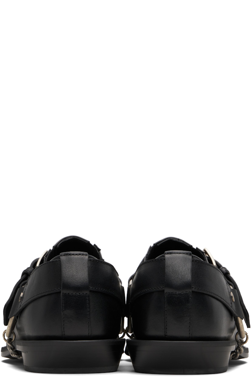 Buffed nappa leather loafers.

· Pointed toe
· Harness-style pin-buckle strap
· Elasticized gusset at sides
· Buffed leather lining
· Stacked leather block heel with rubber injection
· Curb chain detailing at sole
· Polished leather sole

Supplier color: Black