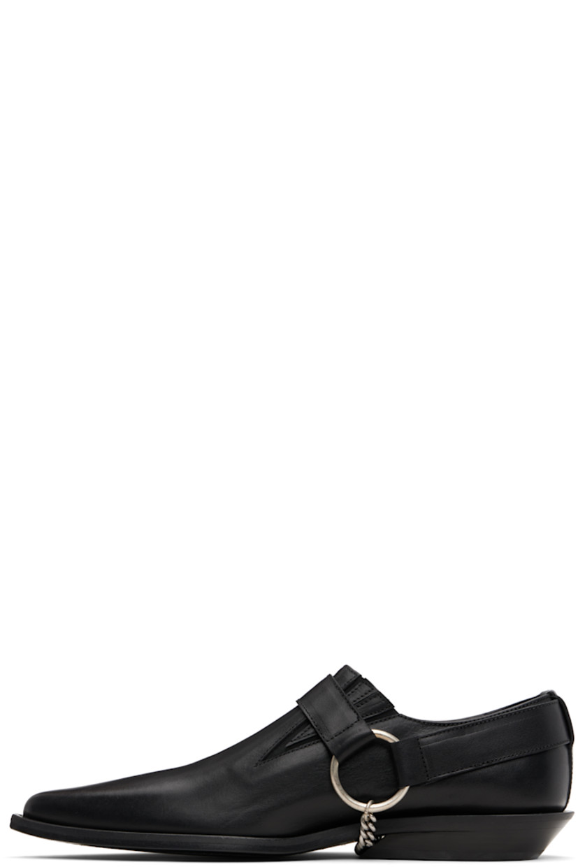 Buffed nappa leather loafers.

· Pointed toe
· Harness-style pin-buckle strap
· Elasticized gusset at sides
· Buffed leather lining
· Stacked leather block heel with rubber injection
· Curb chain detailing at sole
· Polished leather sole

Supplier color: Black