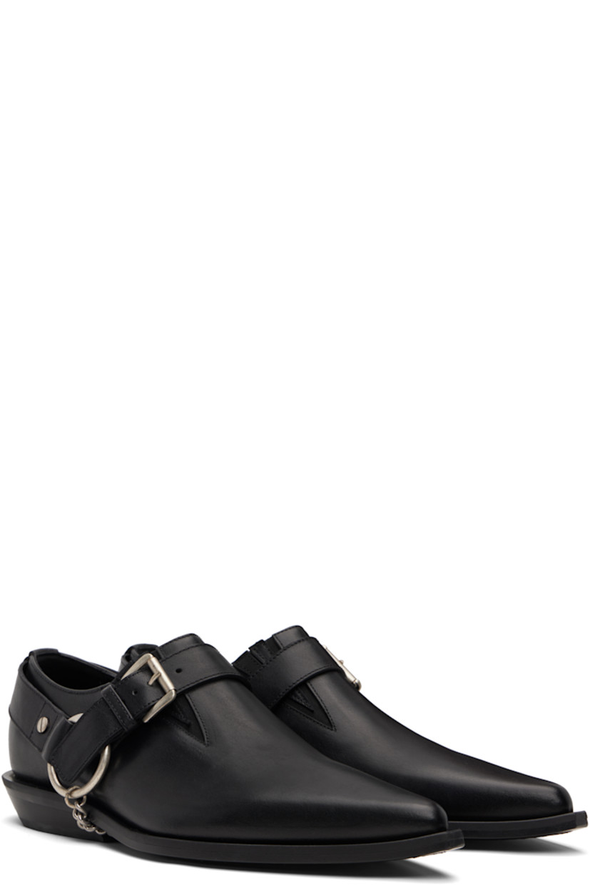 Buffed nappa leather loafers.

· Pointed toe
· Harness-style pin-buckle strap
· Elasticized gusset at sides
· Buffed leather lining
· Stacked leather block heel with rubber injection
· Curb chain detailing at sole
· Polished leather sole

Supplier color: Black