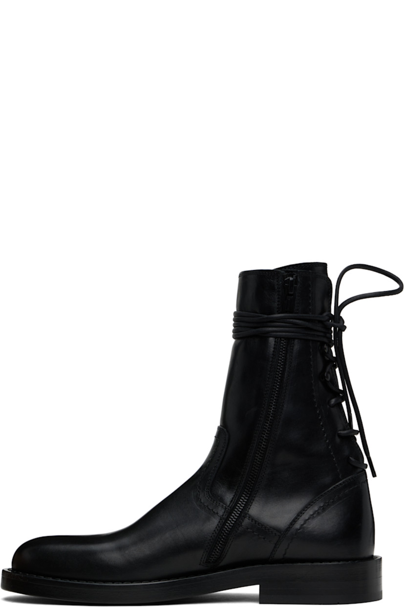 Ankle-high buffed calfskin boots in black.

· Zip closure at inner side
· Lace-up closure at heel counter
· Buffed calfskin and nubuck lining
· Stacked leather block heel with rubber injection
· Nubuck sole
· Heel: H1.25"

Supplier color: Black