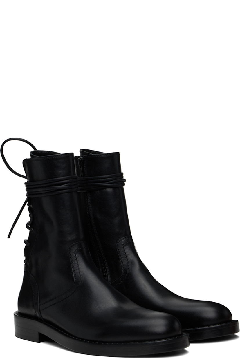 Ankle-high buffed calfskin boots in black.

· Zip closure at inner side
· Lace-up closure at heel counter
· Buffed calfskin and nubuck lining
· Stacked leather block heel with rubber injection
· Nubuck sole
· Heel: H1.25"

Supplier color: Black